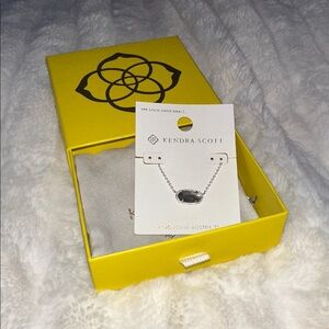 Kendra Scott Silver Jewelry Necklace with Grey Pendant.